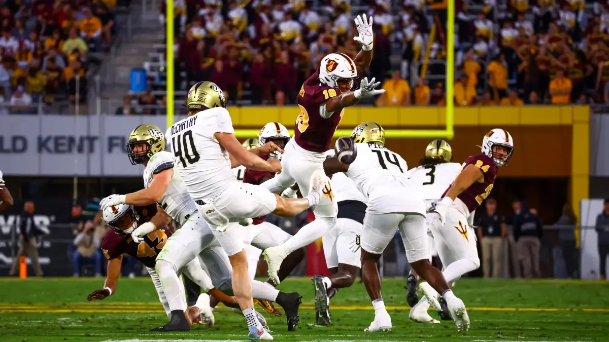 Martell Hughes blocks a punt against UCF. Martell Hughes blocks a punt against UCF.