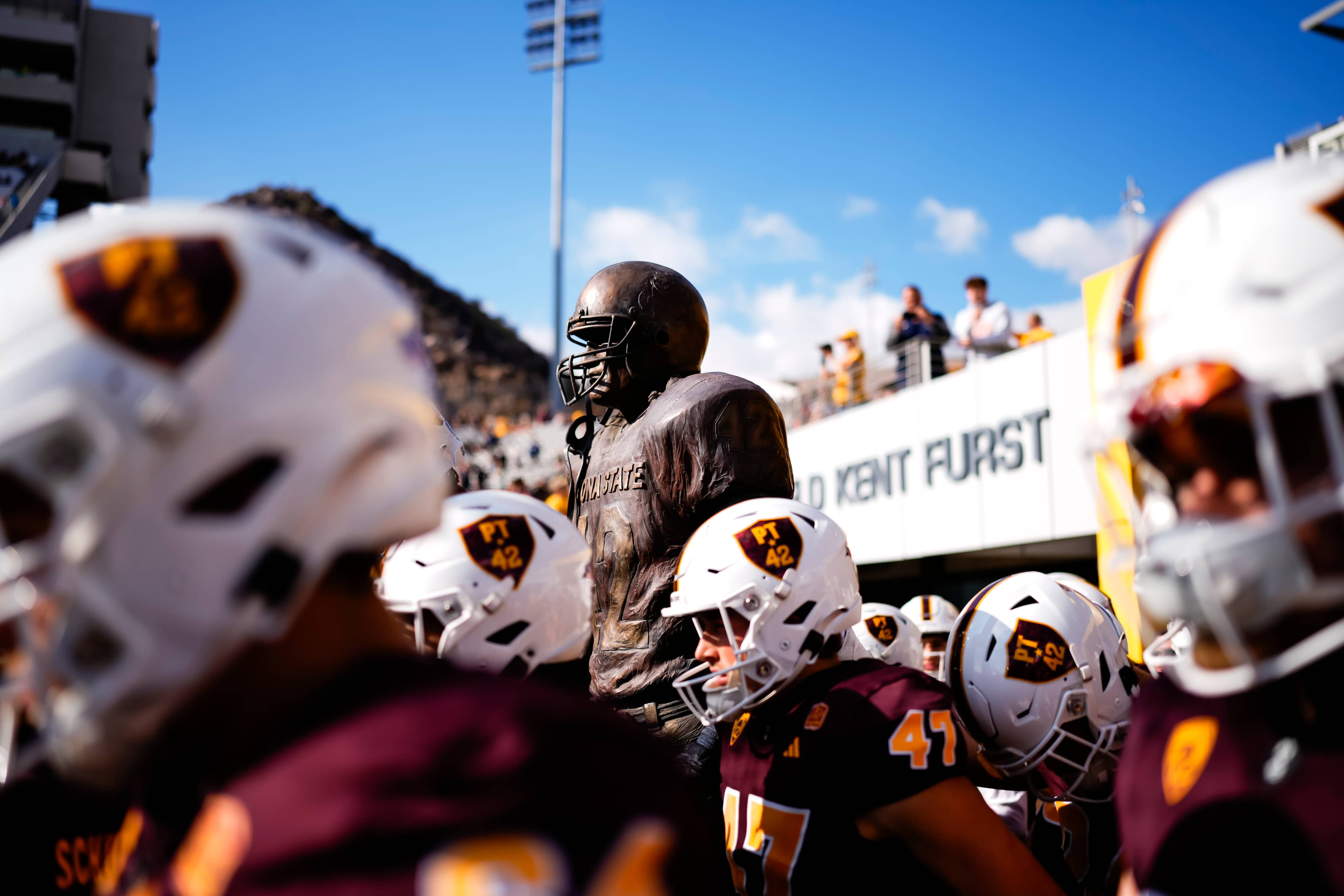 Sun Devil Football with Pat Tillman Statue