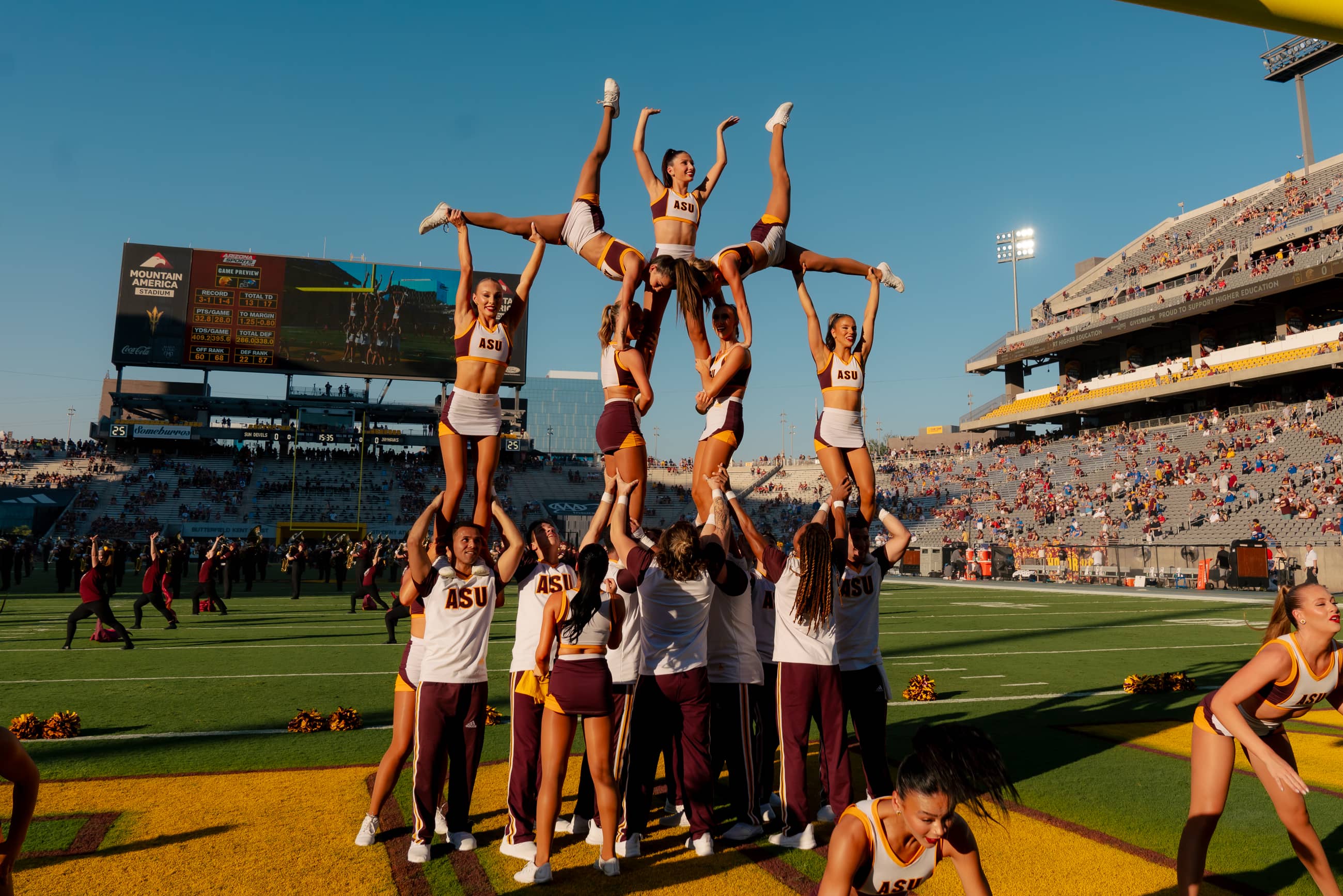 ASU Cheer team doing a pyramid