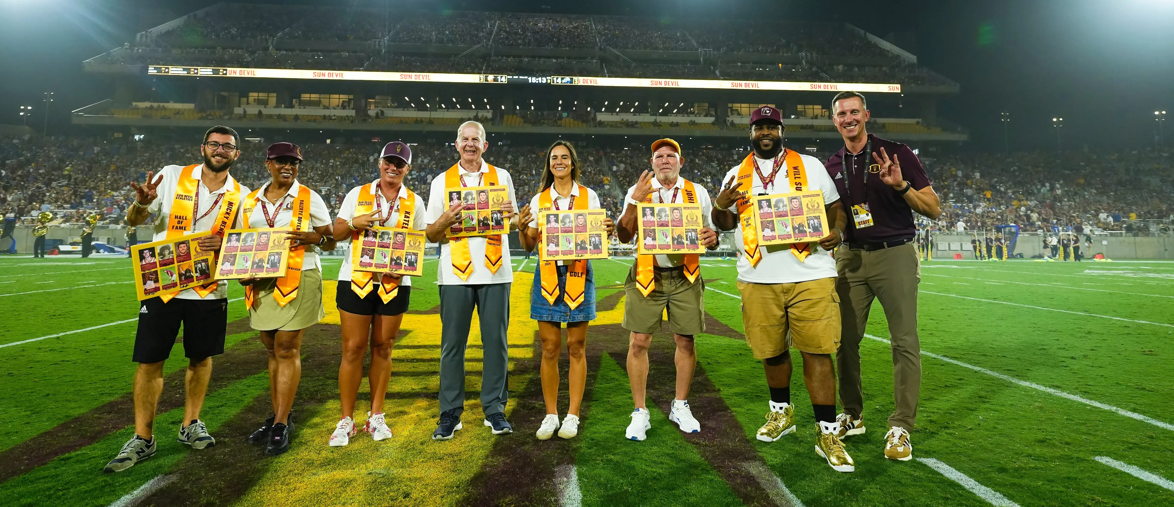 Hall of Famers on the field at Mountain America Stadium