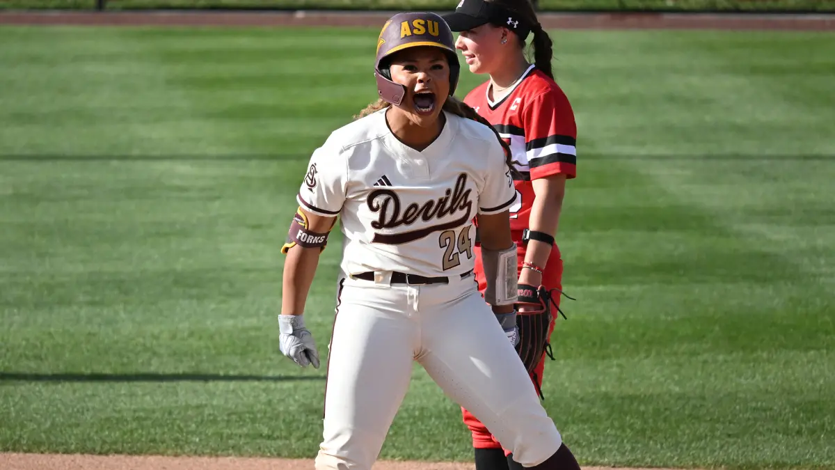 Ashleigh Mejia yells in excitement following her RBI double at Utah Ashleigh Mejia yells in excitement following her RBI double at Utah