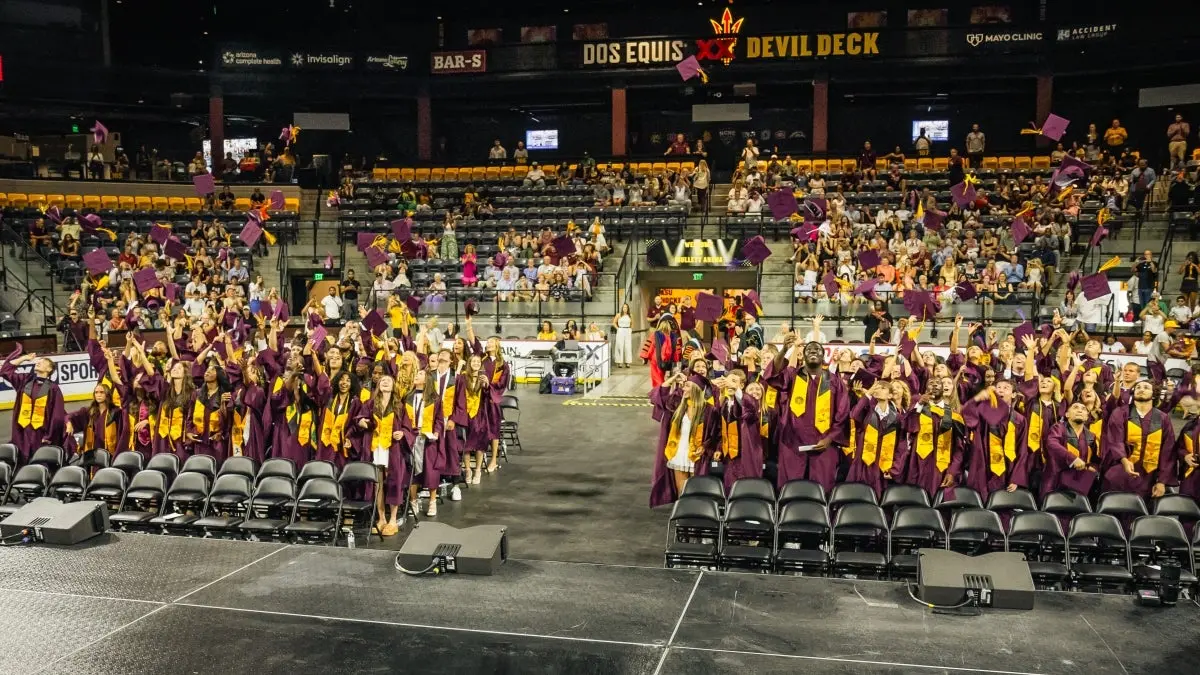 2025 graduates throwing their caps 2025 graduates throwing their caps