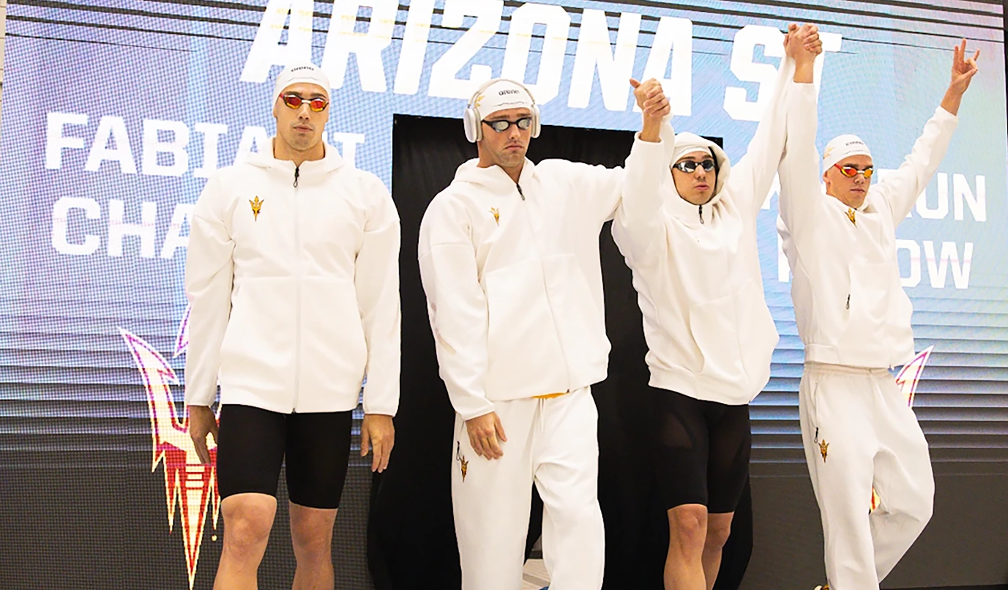400 medley relay sets Big 12 record as men's swimming earns third national title of the week.webp
