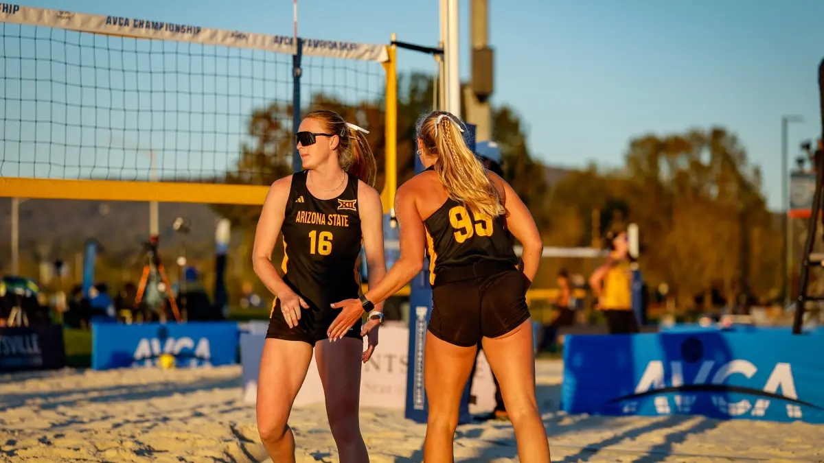 Ava Williamson and Daniella Kensinger high fiving.