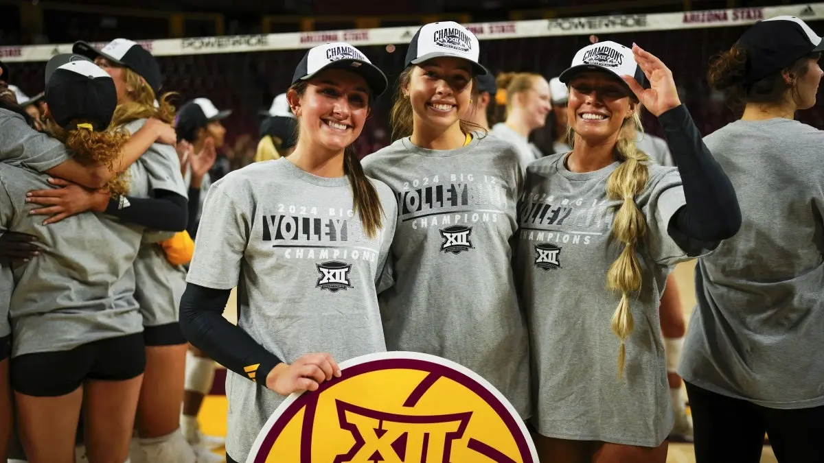 Bella Faria, Brynn Covell and Estella Zatechka pose in their Big 12 Champions gear. Bella Faria, Brynn Covell and Estella Zatechka pose in their Big 12 Champions gear.