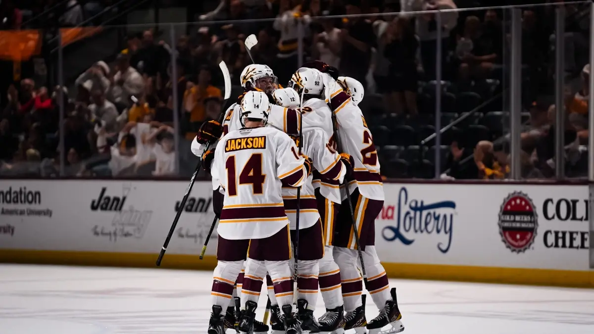 Hockey Celebrates Goal vs. Michigan