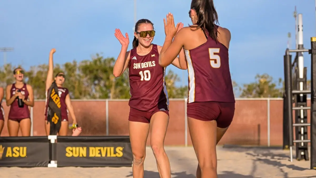 Kendall Whitmarsh smiling and going for a high five. Kendall Whitmarsh smiling and going for a high five.