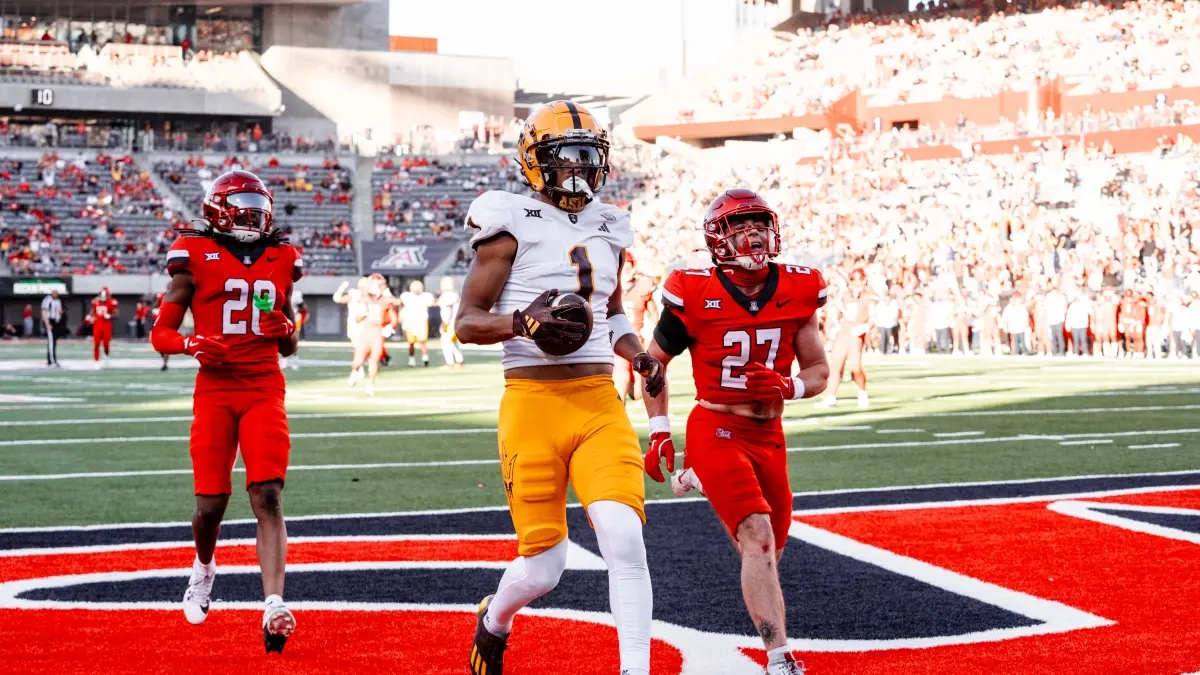 Xavier Guillory takes it to the end zone against Arizona.