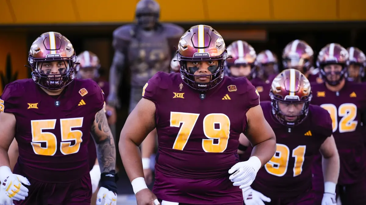 Leif Fautanu leads the Sun Devils onto the field. Leif Fautanu leads the Sun Devils onto the field.