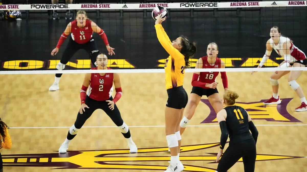 Brynn Covell setting the ball. Brynn Covell setting the ball.