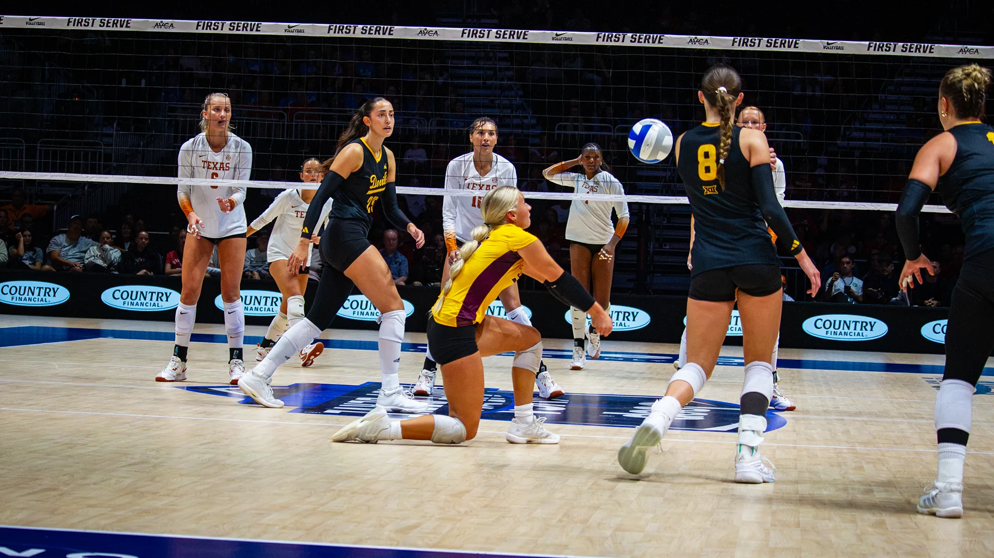 Faith Frame passing the ball.