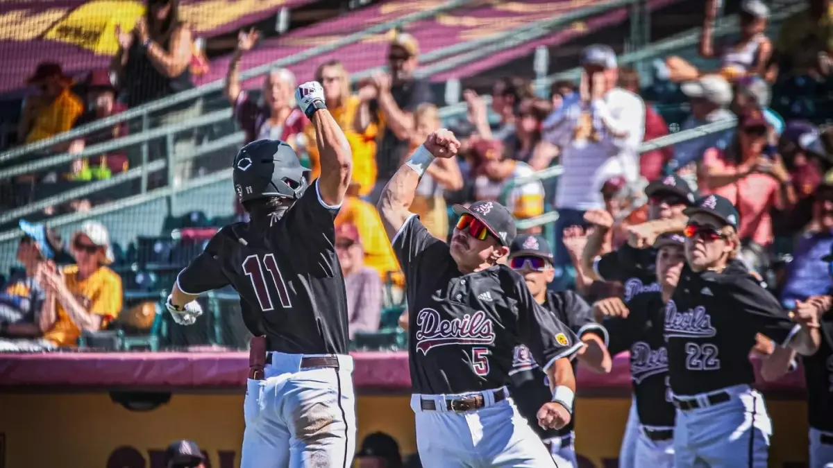 Image from ASU News baseball players celebrating on field