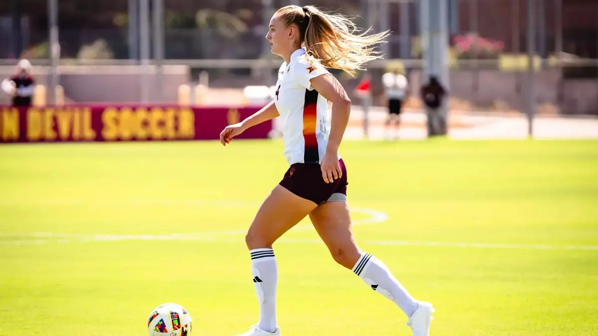 soccer player running down field with ball soccer player running down field with ball