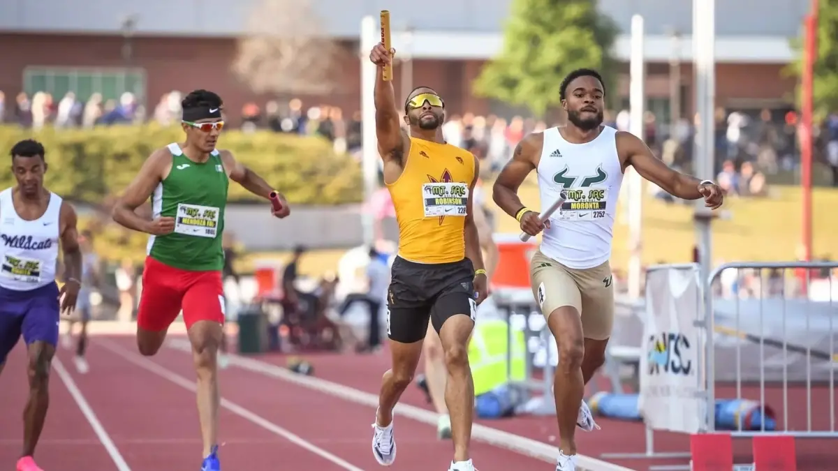 four track and field athletes four track and field athletes