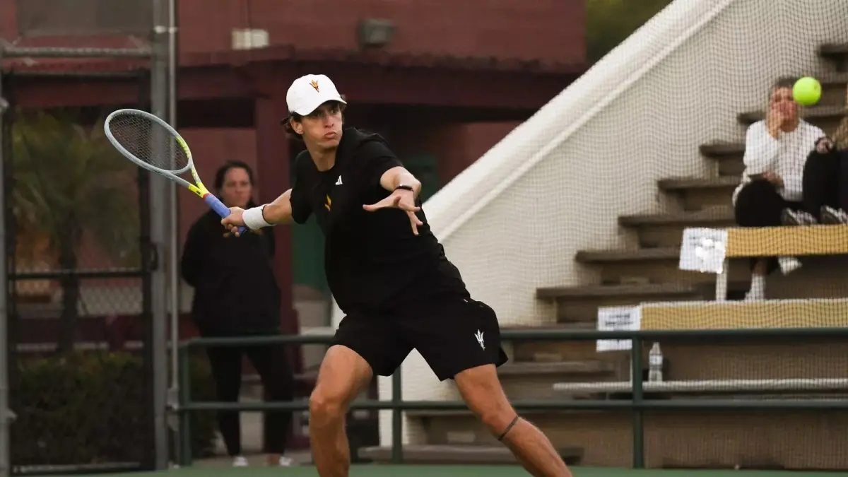 male tennis player about to hit tennis ball male tennis player about to hit tennis ball