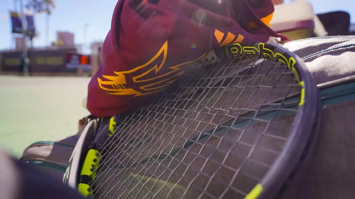 close up of tennis racket and pitchfork on elbow close up of tennis racket and pitchfork on elbow