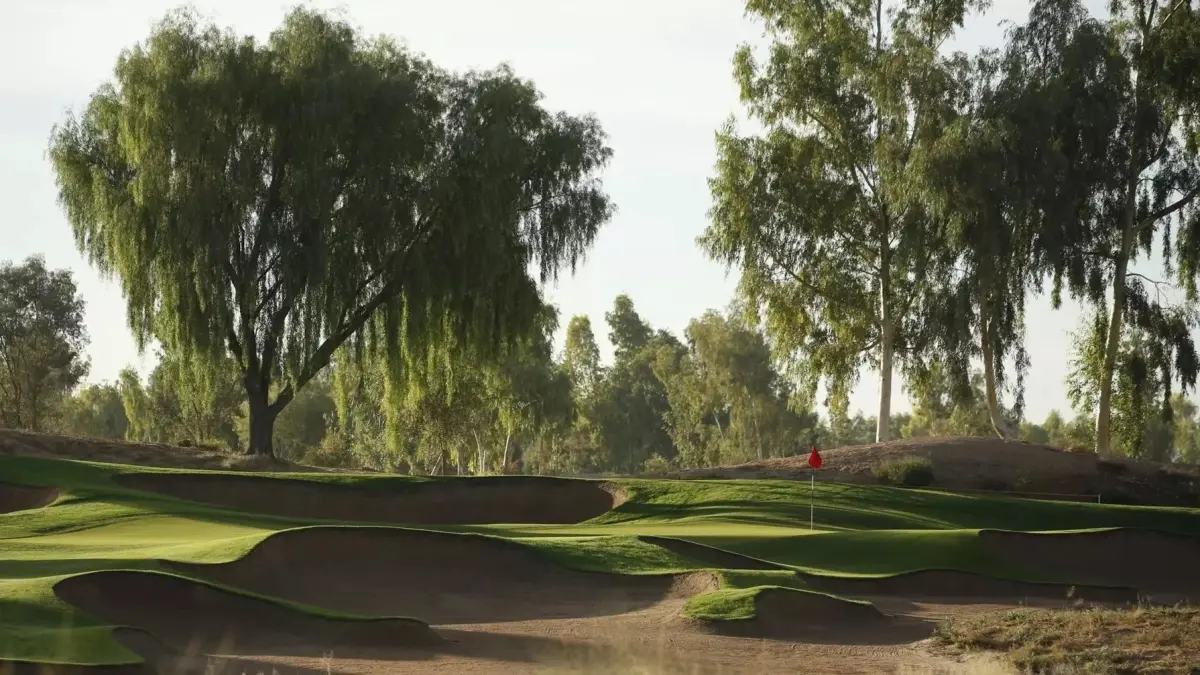 Southern Dunes Golf Club green and trees Southern Dunes Golf Club green and trees
