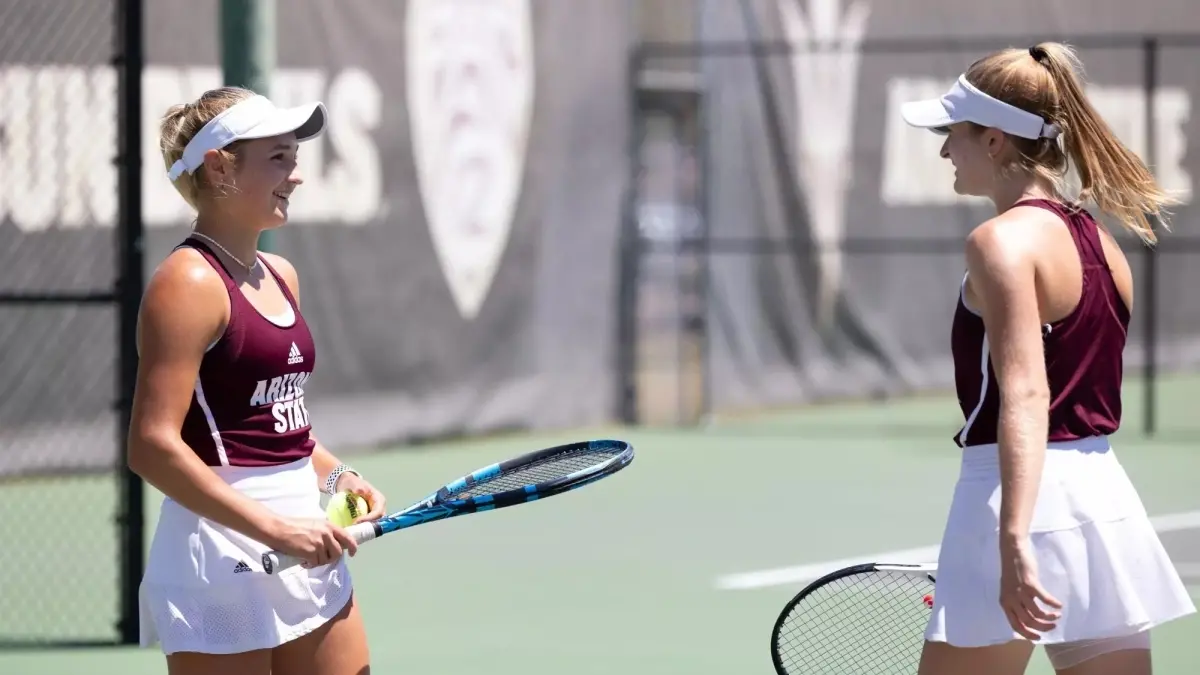 two tennis players on court two tennis players on court