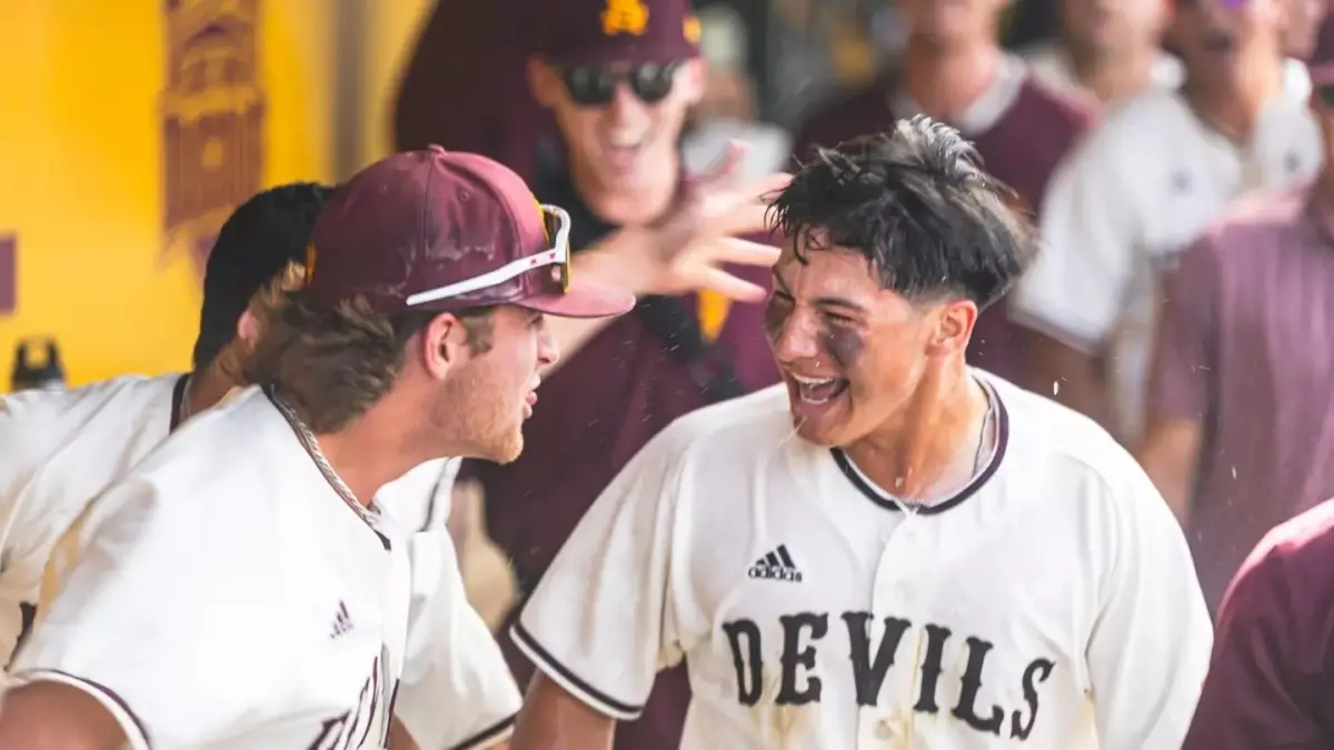 Image from ASU News baseball players celebrating on field