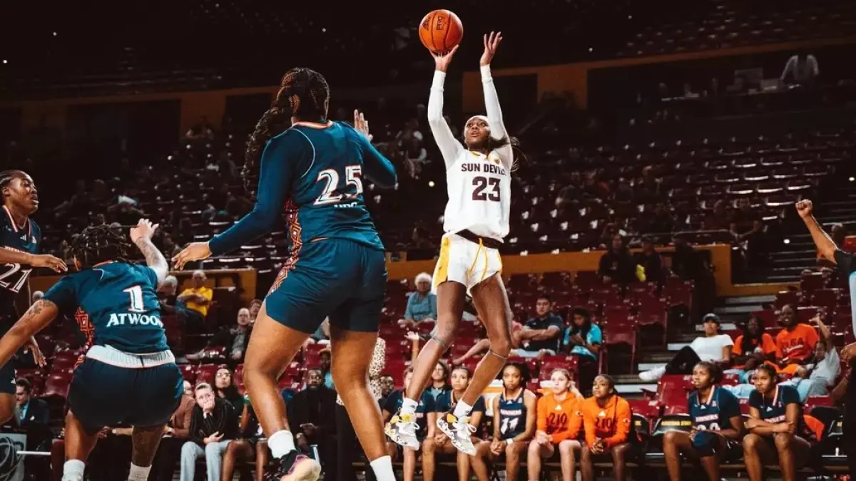woman about to throw basketball woman about to throw basketball