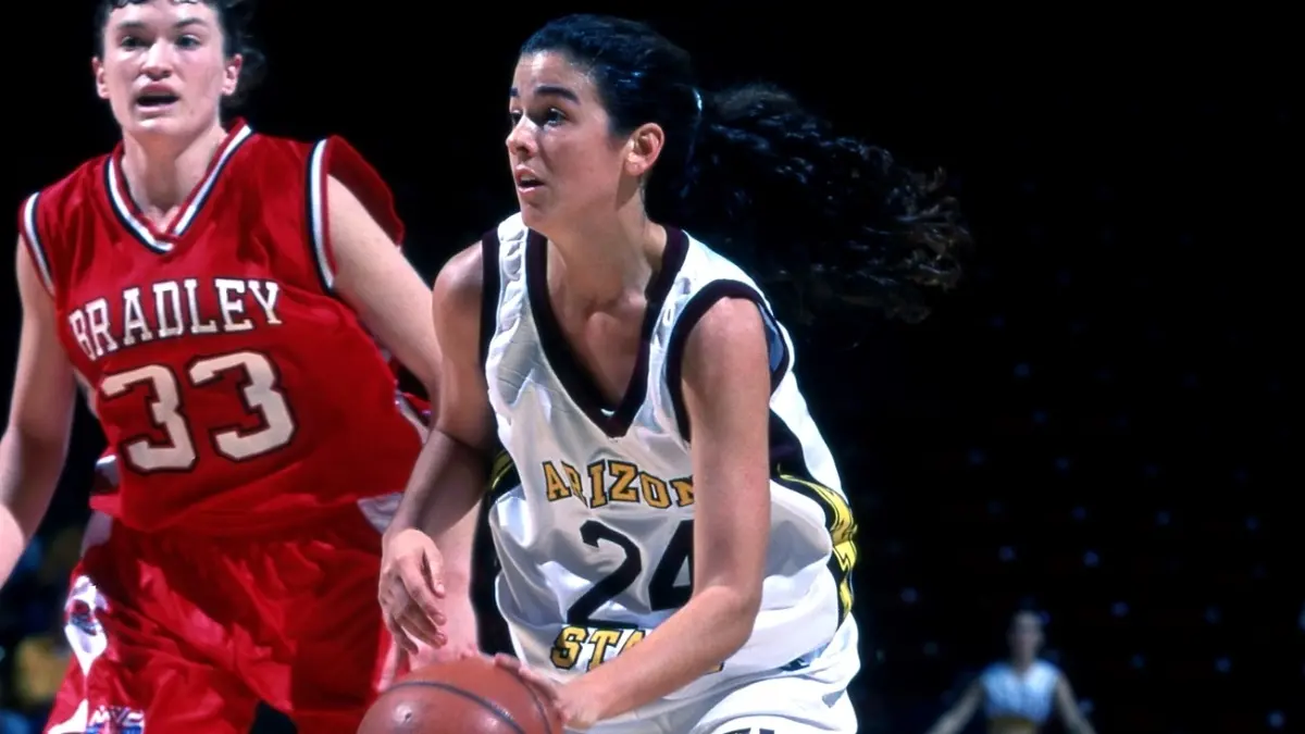 Molly Tutor playing basketball for Sun Devils