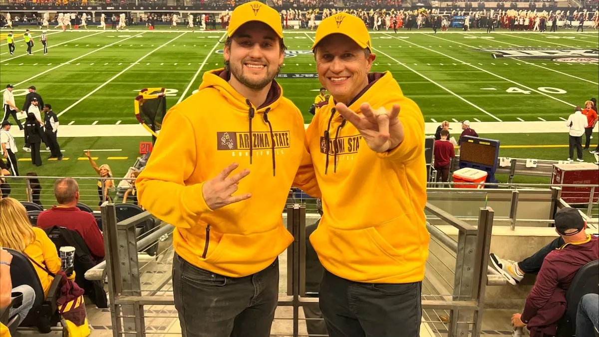Two fans at a football game. Two fans at a football game.