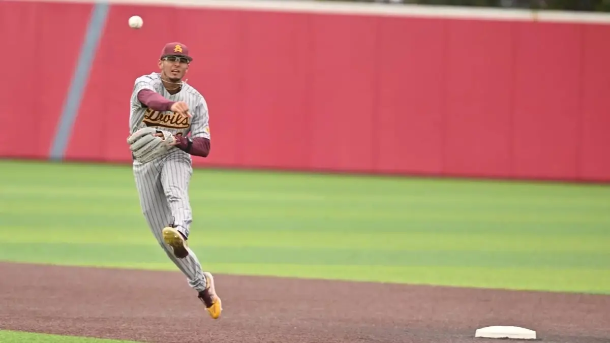 Image from ASU News baseball player throwing ball during game