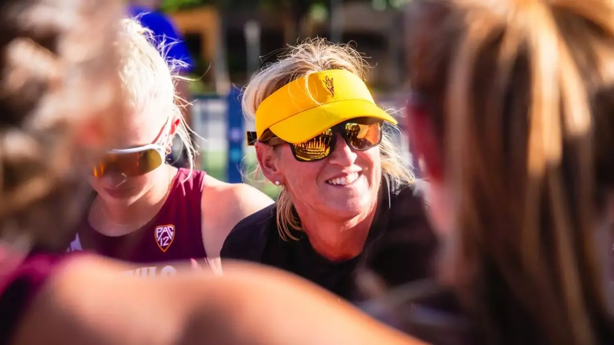 Image from ASU News beach volleyball coach and team
