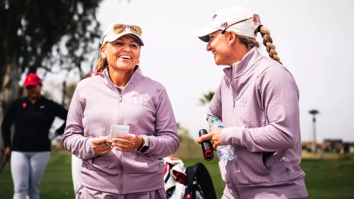 two women golf coaches