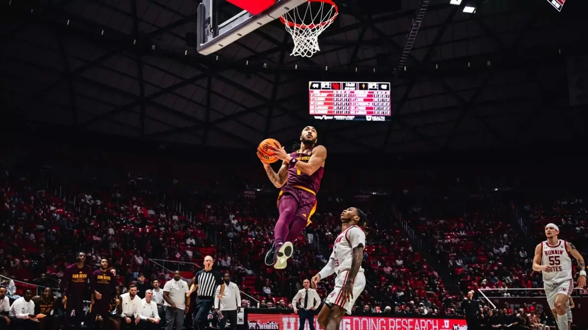 basketball player about to throw basketball in
