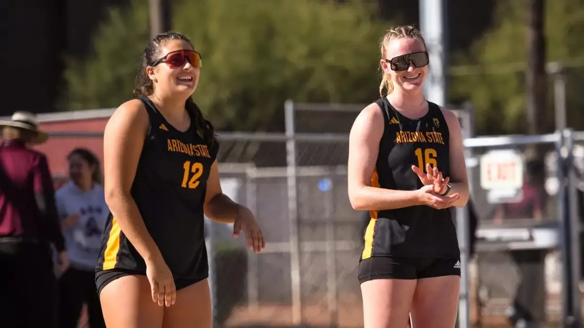 two beach volleyball players two beach volleyball players