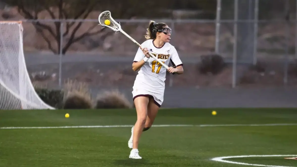 lacrosse players running