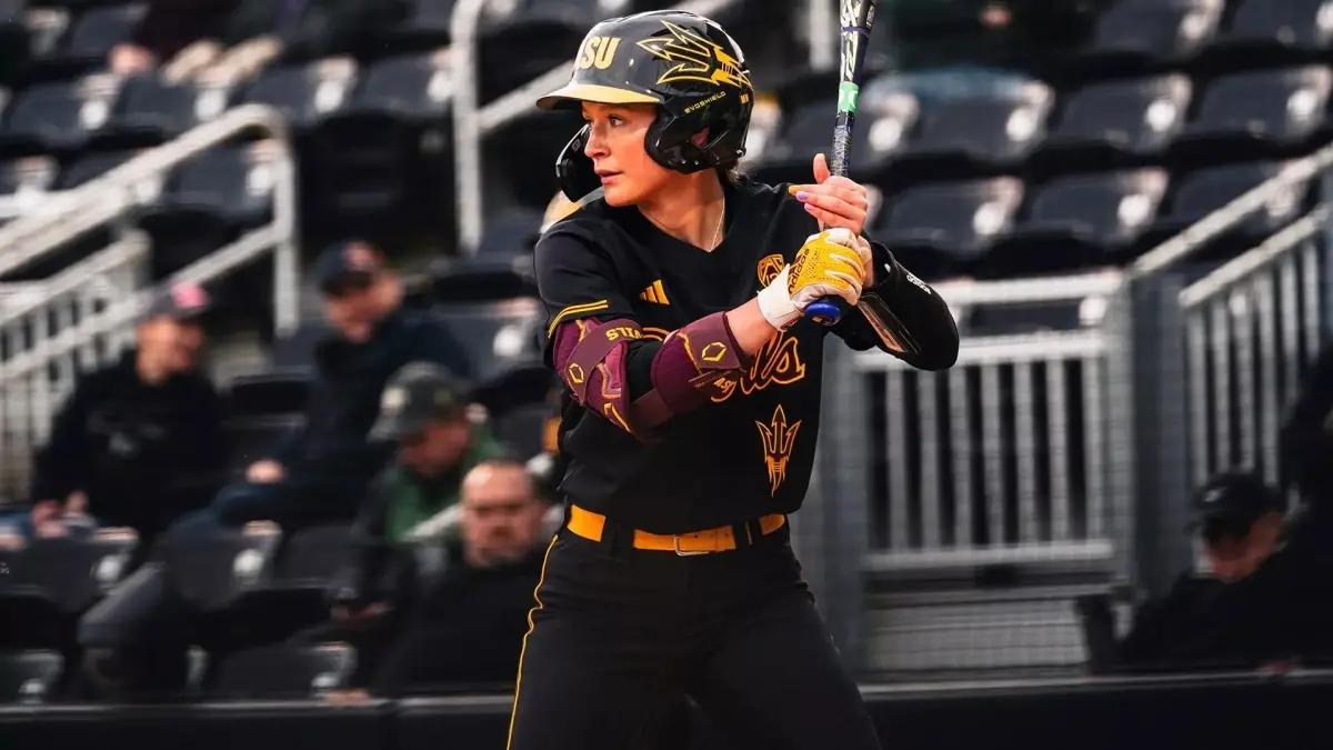 softball player holding bat softball player holding bat