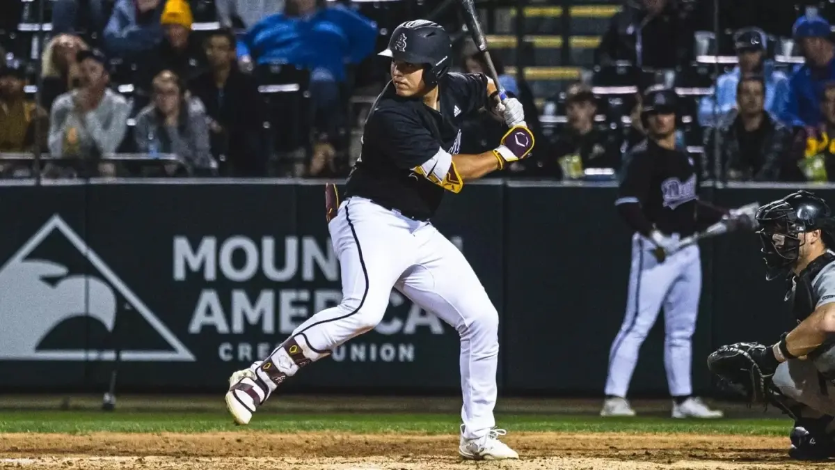 Image from ASU News baseball player holding bat
